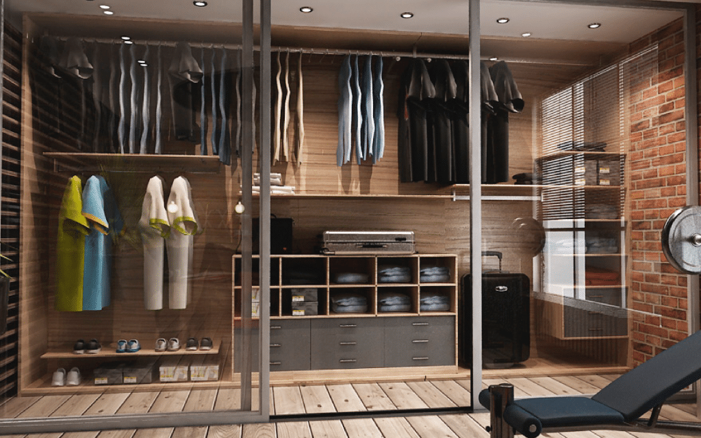 Large walk-in wardrobe in light coloured wood with lots of short hanging for shirts and open storage for luggage.